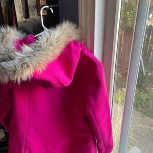 Pink winter coat with faux fur hood
